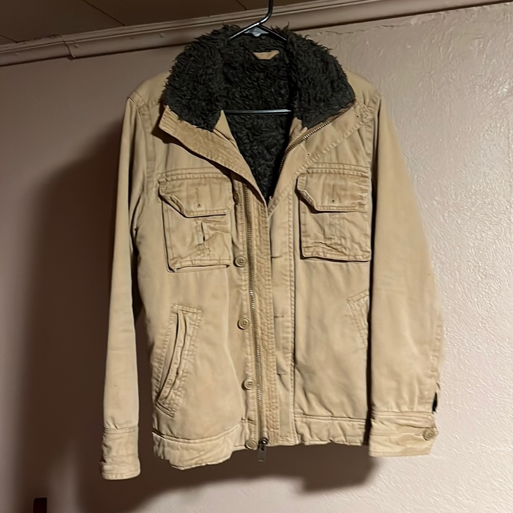 Nice faux fur lined jacket, very comfy and classy. Lean cut for more fitted look
